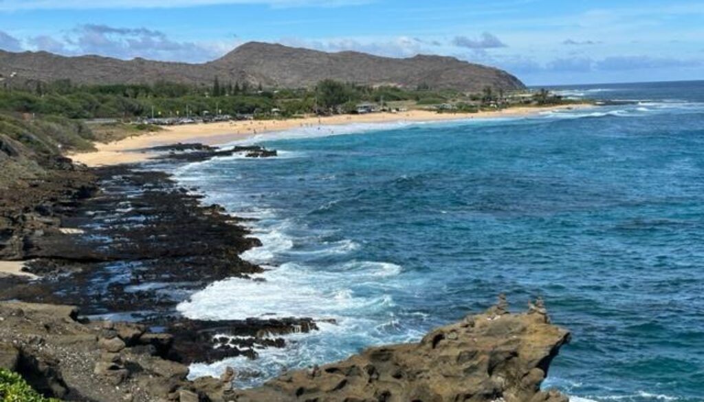 Rocky oceanic coastline with road photo with photo by Hawaii Concierge Couseling by Bruce Berger