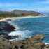 Rocky oceanic coastline with road photo with photo by Hawaii Concierge Couseling by Bruce Berger